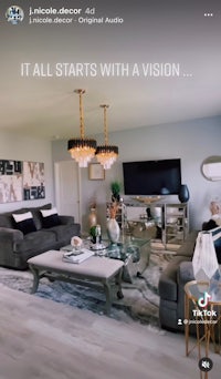 a photo of a living room with furniture and a fireplace